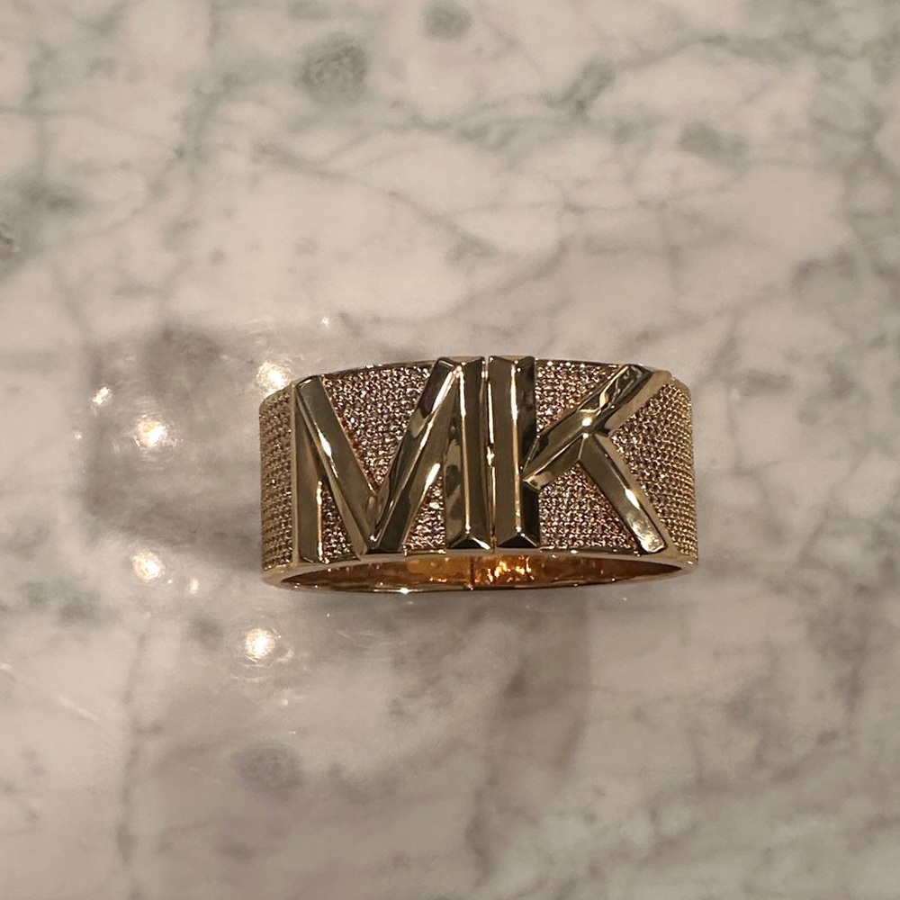 Michael Kors Gold-Tone magnetic bangle with crystal’s never worn